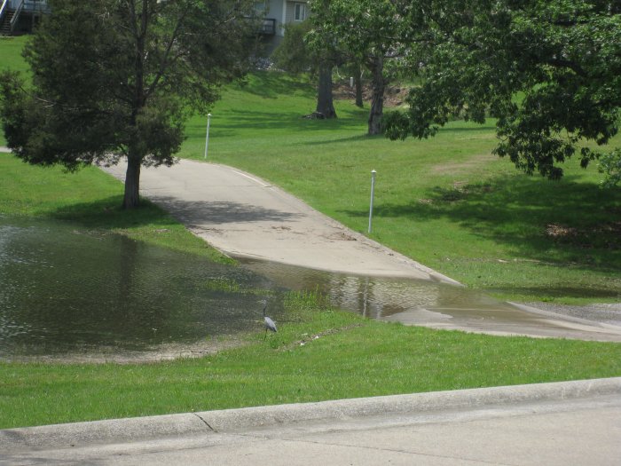 Flooded driveway at Big Bear. I hear the bluegill fishing is great off the road to the right there...